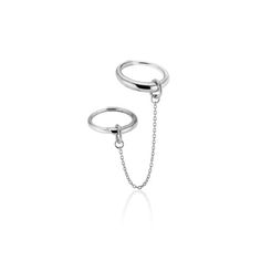 All sizes are on pre-order (5-6 week lead time) except for size 6/7, which is in stock. Sterling silver ring set with chain Innovative, edgy, & feminine. Elevate any outfit with this modern take on the chain ring.From day to night, wear this set three ways - let the chain drape for an editorial look or wrap it and stack it to create the illusion of a third band. Rings are sized for ring and pointer fingers ie. 6 for ring, 7 for pointer = 6/7 Adjustable Modern Ring, Modern Sterling Silver Double Chain Jewelry, Modern Adjustable Chain Ring, Silver Minimalist Chain Ring, Minimalist Silver Chain Ring, Silver Minimalist Open Chain Ring, Minimalist Silver Midi Rings With Adjustable Chain, Modern Silver Chain Ring, Sterling Silver White Gold Open Chain Ring