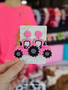 These stylish 2-Tier Farm Tractor Beaded Embroidery Earrings are intricately designed and finely crafted with a combination of bead and thread embroidery. The lightweight design includes a two-tier feather motif, adding a touch of sophistication and eye-catching flair to every ensemble. HEIGHT: 2.3" WIDTH: 2.4" FARM TRACTOR FARMING COUNTRY GIRL AGRICULTURE SOUTHERN COUNTRY FARM LIFE BEADED EMBROIDERY DROP DANGLE NOVELTY Beaded Embroidery Earrings, Tractor Farming, Pink Tractor, Personalized Bible Cover, Embroidery Earrings, Personalized Bible, Christmas Gift Card, Sky Design, Valentines School