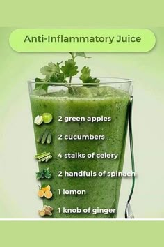 the green smoothie is in a tall glass with ingredients on top and below it