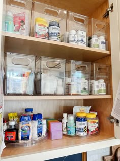 an organized pantry with clear bins and plastic containers