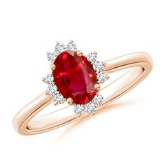 an oval shaped ruby and diamond ring