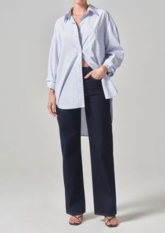 Known for our timeless wovens, we introduce our newest best-seller - the Cocoon Shirt. This oversized silhouette is perfect for pairing back to a sleek skinny or classic cargo. This fit is true to size. Looks Like: Baby sky blue Feels Like: Breathable, ultra-lightweight cotton From our HUMANITY Collection Timeless Relaxed Fit Top For Business Casual, Timeless Tops For Business Casual With Relaxed Fit, Classic Oversized Tops For Workwear, Timeless Relaxed Fit Tops For Work, Timeless Relaxed Fit Workwear Tops, Timeless Relaxed Fit Tops For Daywear, Oversized Classic Tops For Business Casual, Oversized Blouse For Business Casual, Oversized Cotton Top For Business Casual