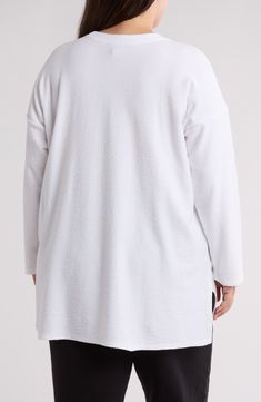 This long-sleeve tunic in an easy, relaxed fit is an excellent addition to your chill-time wardrobe. 30" length Crewneck Long sleeves 100% organic cotton Machine wash, tumble dry Made in Peru Cotton Tops For Relaxation In Fall, Fall Cotton Tops For Relaxation, White Long Sleeve Tops For Relaxation, Winter Long Sleeve Tops For Relaxation, White Relaxed Fit Long Sleeve Top For Layering, White Long Sleeve Tunic For Loungewear, White Long Sleeve Relaxation Top, Long Sleeve Relaxed Fit Tunic For Beach Cover-up, French Terry Tops With Double-lined Hood For Loungewear