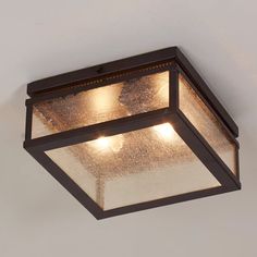 a ceiling light with three lights on it