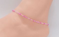 .  Beach Anklet, Beaded Anklet, Anklet Jewelry, Ankle Bracelet, Boho Anklet, Hippie Anklet, Gift For Her, Women's, Pink Anklet, Hippie Anklet, Clear Anklet Dainty anklet is made with 11/0 Czech seed beads in different shades of pink and clear, with 2mm silver filled beads with a lobster clasp.  All items in my store are made buy me. Please send me a message if you want a custom order or need a size that is not listed in the drop down menu.  Size: Measure your anklet above the anklet bone with me Cheap Pink Beaded Anklets, Cheap Pink Round Beads Anklets, Cheap Pink Round Bead Anklets, Pink Anklet, Dainty Anklet, Hippie Bracelet, Beaded Anklet, Anklets Boho, Beach Anklets