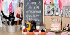 an image of a dessert bar set up for a baby shower or bridal party