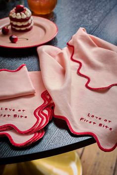 Add these quirky Rockett St George First Bite Napkins to your tablescape for a fun and flirty finish. Made from pure cotton with scalloped edges and embroidered slogan. Machine washable. 4 x Napkins 100% Cotton. Fork And Knife, Rockett St George, Embroidered Napkins, Pink Table, First Bite, Striped Rug, Scalloped Edges, Cotton Napkins, St George