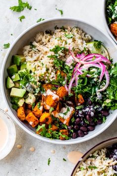 two bowls filled with different types of food