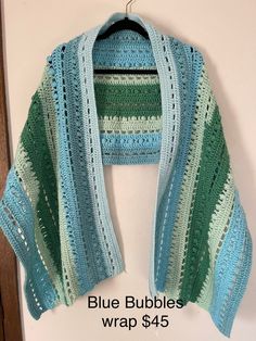 This beautiful rectangle wrap is called Blue Bubbles.  She is hand made by myself using quality yarn. Blue Crochet Shawl One Size, Blue Handmade Beach Shawl, Handmade Blue Shawl For The Beach, Blue Crochet Yarn Shawl, Blue Bubbles, By Myself, Crochet Art, Fiber Art, Hand Made