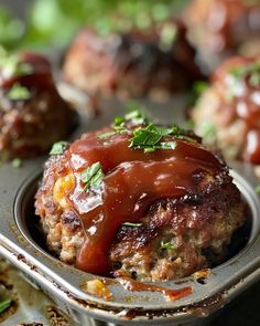 meat patties covered in ketchup and garnished with parsley