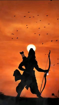 the silhouette of a person holding a bow and arrow in front of an orange sky