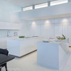 the kitchen is clean and ready to be used for cooking or eating, while also being used as a dining room