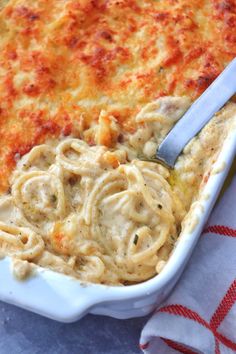 a casserole dish with noodles and cheese in it