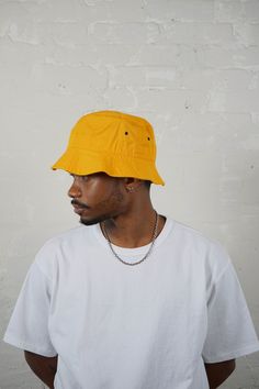 100% Cotton Foldable One size fits all Cheap Yellow Hats For Fall, Adjustable Cheap Playful Bucket Hat, Cheap Yellow Baseball Cap For Summer, Cheap Yellow Hats For Festivals, Cheap Orange Bucket Hat For Summer, Yellow Festival Hat, Casual Reversible Yellow Bucket Hat, Trendy Adjustable Yellow Bucket Hat, Cheap Yellow Bucket Hat