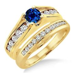 a blue and white diamond ring set with two matching bands on the band, in yellow gold