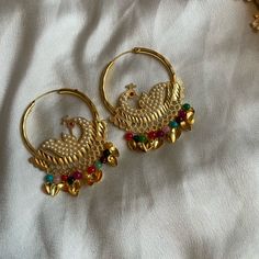 Multicolor Morni (Peacock) Hoop Earrings Color: Mainly Gold With Multicolor Beads Condition: New Comes As Shown In The Picture Multicolor Round Hoop Earrings For Wedding, Multicolor Chandbali Hoop Earrings For Party, Multicolor Festive Round Hoop Earrings, Multicolor Peacock Design Earrings For Party, Handmade Multicolor Hoop Earrings For Wedding, Traditional Small Hoop Multicolor Earrings, Traditional Multicolor Small Hoop Earrings, Multicolor Chandbalis For Pierced Ears, Multicolor Dangle Hoop Earrings For Wedding