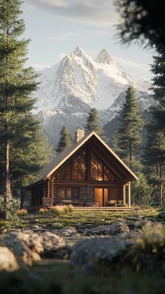 a log cabin in the woods with mountains in the backgroung and snow - capped peaks behind it