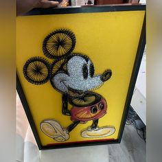 the painting on the wall is made to look like mickey mouse