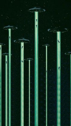 an image of green poles in the dark