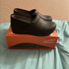 Worn Twice. Slip Resistant. Will Clean Before Shipping Comfortable Slip-resistant Black Clogs, Black Leather-lined Slip-on Clogs, Medium Width Slip-on Clogs With Removable Insole, Black Leather Sole Slip-on Clogs, Dansko Clogs, Black Slip-on Clogs With Ortholite Insole, Dansko Shoes, Mule Clogs, Mules Shoes