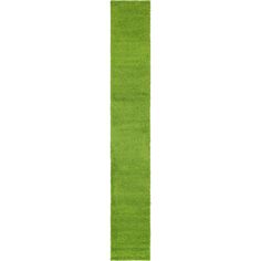 a long green rug on a white background