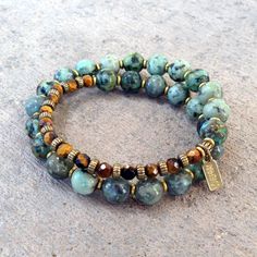 Change and Prosperity, African turquoise and tiger's eye 27 bead wrap mala bracelet – Lovepray jewelry Pear Shaped Diamond Necklace, African Inspired Jewelry, Handmade Jewelry Findings, Om Charm, Eye Bracelets, African Turquoise, Jewelry Beaded, Mala Bracelet, Beaded Wraps