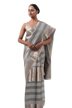 Grey handloom banarasi saree with stripe pattern in zari work. Comes along with unstitched blouse piece. - Aza Fashions Handloom Semi-stitched Cotton Silk Blouse Piece, Semi-stitched Handloom Cotton Silk Blouse Piece, Elegant Cotton Silk Handloom Blouse, Fitted Tussar Silk Handloom Blouse Piece, Designer Handloom Cotton Silk Blouse, Handloom Cotton Silk Pre-draped Saree, Handloom Tissue Silk Blouse Piece, Fitted Handloom Saree For Eid, Transitional Season Handloom Cotton Silk Pre-draped Saree