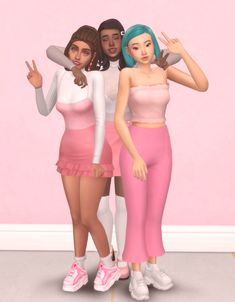 three females standing next to each other in front of a pink wall