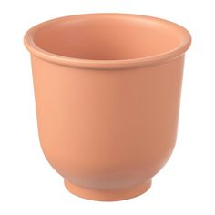 a pink cup is shown on a white background