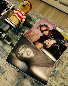 a table topped with pictures and stuffed animals