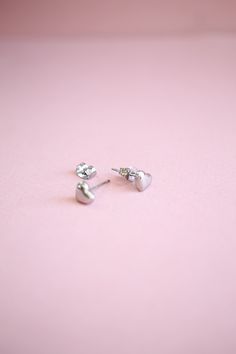 The cutest stud to ever exist! Perfect for all ages, all year round, to give your ears a little love! This cute stud works great in a lobe piercing as well as helix piercings too! It's made out of stainless steel so it's incredibly high quality and works for even the most sensitive ears. This earrings is basic you need in your jewelry box asap! This stud earring is .2 inches in length. It is made of stainless steel posts so it is nickel free, hypoallergenic, and the best of the best for even the Silver Heart Cartilage Earrings As Gift, Adjustable Silver Heart Piercings, Minimalist Hypoallergenic Heart-shaped Piercings, Minimalist Hypoallergenic Heart Piercings, Hypoallergenic Heart Shaped Minimalist Piercing, Minimalist Hypoallergenic Heart Piercing, Trendy Silver Hypoallergenic Heart Earrings, Dainty Silver Heart Cartilage Earrings, Heart-shaped Internally Threaded Earrings As Gift