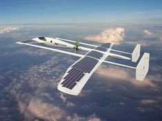 an artist's rendering of a solar powered plane flying in the sky above clouds