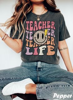 "Get ready to rock that casual chic look with our \"Leopard Smiley Face\" Teacher Tshirt. ❤️ Get retro with this smiley teacher Shirt! Featuring a smiley face and a happy teacher life vibe, this design is perfect for all cool teachers out there. Show off your retro style and spread some fun and positive vibes with this Teacher Smiley shirt. ❤️ Size up, babe! Go 1-2 sizes bigger for that oversized stunner. Elevate your style, own the spotlight, and unleash your fashion power. It's time to rock th Funny Nurse Shirts, Dance Mom, Pregnancy Announcement Shirt, Smiley Faces, Teacher Tees, Funny Mom Shirts, Concert Shirts, Concert Tees, Color Care