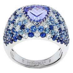 Tanzanite 2.80 Carat Diamonds Blue Sapphires White 18 Karat Gold Riviera Ring The name and the variety of colours in this collection are associated with the bright Italian and French Riviera, vivid and colourful houses and sun reflections on the water. A place where grow cypresses, palm trees and chestnuts, where there are many gardens, parks and vineyards. Many works by Auguste Renoir, Henri Matisse, Paul Signac were made in these places. Inspired by these beauties, we present you the Riviera c Paul Signac, Zipper Jewelry, Auguste Renoir, Diamond Fashion Rings, Pink Bracelet, Cocktail Rings, Amazing Jewelry, Vintage Rings, Blue Sapphire