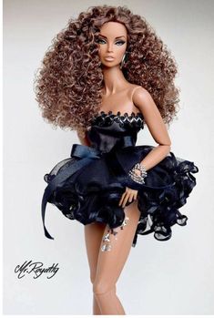 a barbie doll wearing a black dress and high heels