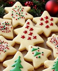 christmas cookies decorated with icing and sprinkles