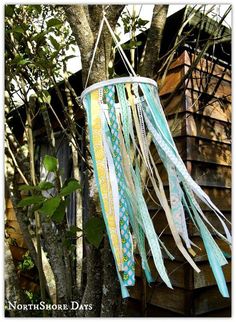 a wind chime hanging from a tree