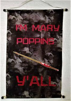 a sign that says in mary poppinss y'all with a knitting needle on it