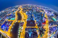 an aerial view of a city at night