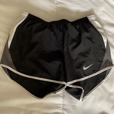 Super Cute Black Nike Shorts (Lined) With White And Grey Accents Drawstring To Tighten The Waist Brand New, Never Worn With Tags Still Attached No Known Flaws Nike Gray Stretch Shorts, Grey Nike Shorts, Black Nike Pros, Black Nike Shorts, Classic Sportswear, Yellow Nikes, Black Athletic Shorts, Nike Classic, Athleisure Casual