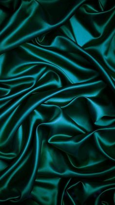 the green fabric is very soft and shiny