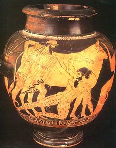 an ancient vase with two men riding horses