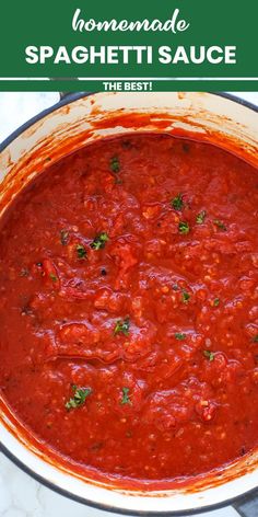 the best homemade spaghetti sauce in a pan with parsley on top and text overlay that reads homemade spaghetti sauce