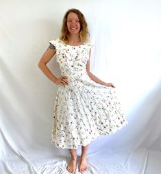 Lovely dress -- material feels like cotton.   So super cute! Love the fabric Great vintage shape No tag Side metal zipper Lying flat... across waist: ~15" ~21" armpit to armpit 46" top to bottom of dress Candle Bouquet, Bouquet Flower, Rose Candle, Printed Cotton Dress, Dress Material, Novelty Print, Metal Zipper, Lovely Dresses, 1950s Vintage