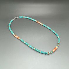 This stunning handcrafted Southwestern style necklace contains AAA grade, smooth, Genuine blue green Kingman Turquoise and orange Spiny Oyster heishi, solid 925 sterling silver hammered rondelle beads finished with solid 925 sterling silver jewelry findings (crimps, crimp covers, wire guards, jump rings and clasp). Each bead in this necklace is hand selected, then strung on professional quality stainless steel bead wire to ensure the best quality. 100% Natural Kingman Turquoise. Not dyed, treate Southwestern Adjustable Turquoise Necklace Hand-strung, Southwestern Style Adjustable Hand-strung Turquoise Necklace, Southwestern Silver Turquoise Multi-stone Necklace, Southwestern Style Blue Turquoise Nickel-free Necklace, Southwestern One-of-a-kind Turquoise Necklace, Spiny Oyster, Orange And Turquoise, Kingman Turquoise, Southwestern Style