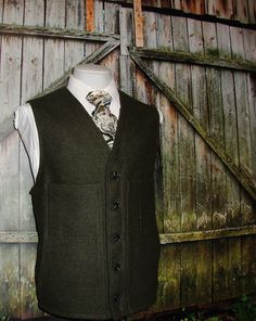 "Goodmorning! vintage rare trad heavy virgin wool tweed green  army green tactical vest  waistcoat. The vest waistcoat features  five-button front closure, two front chest pocket. Left pocket  has multiple tactical pocket as well as slant hip pockets . This vest is a great find for ardent vintage enthusiast with taste and style. Estimated size: 46  : Please see measurement below , for best fit compare measurement with similar vest waistcoat or item. Armpit to Armpit: 24\" Front Length: 26\" Cond Military Style Khaki Vest For Winter, Military Style Winter Workwear Vest, Winter Military Work Vest, Green Winter Vest With Buttons, Classic Green Vest For Winter, Classic Green Winter Vest, Green Waistcoat, Vest Waistcoat, Tactical Vest