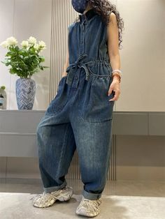 women's jean overall pants Introducing our women's jean overall pants wide leg denim jumpsuit, designed for the modern woman who values both fashion and functionality. This Retro Cargo Jean is not just an outfit; it's a statement of style that sets you apart from the crowd. Key Features: Premium Denim Fabric: Crafted from high-quality denim, this jumpsuit offers durability and a comfortable fit, perfect for spring and autumn wear. Trendy Wide Leg Design: The wide leg cut adds a fashionable touch Overall Pants, Autumn Wear, Low Heel Shoes, Pants Wide Leg, Leg Design, Cargo Jeans, Denim Jumpsuit, Wide Leg Denim, Spring And Autumn