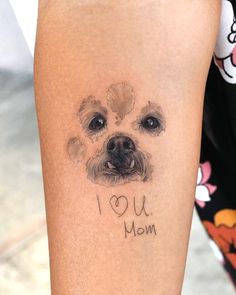 a dog's face is shown with the words i love you mom written on it