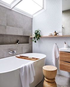 an instagram page with a bathtub and sink