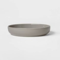 a white bowl sitting on top of a table